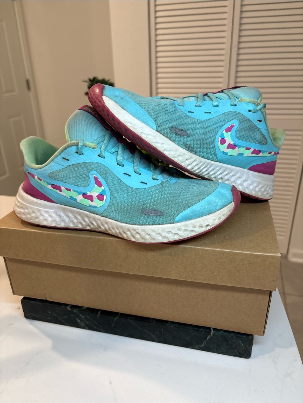 Nike Revolution Teal Running shoes size 7Y